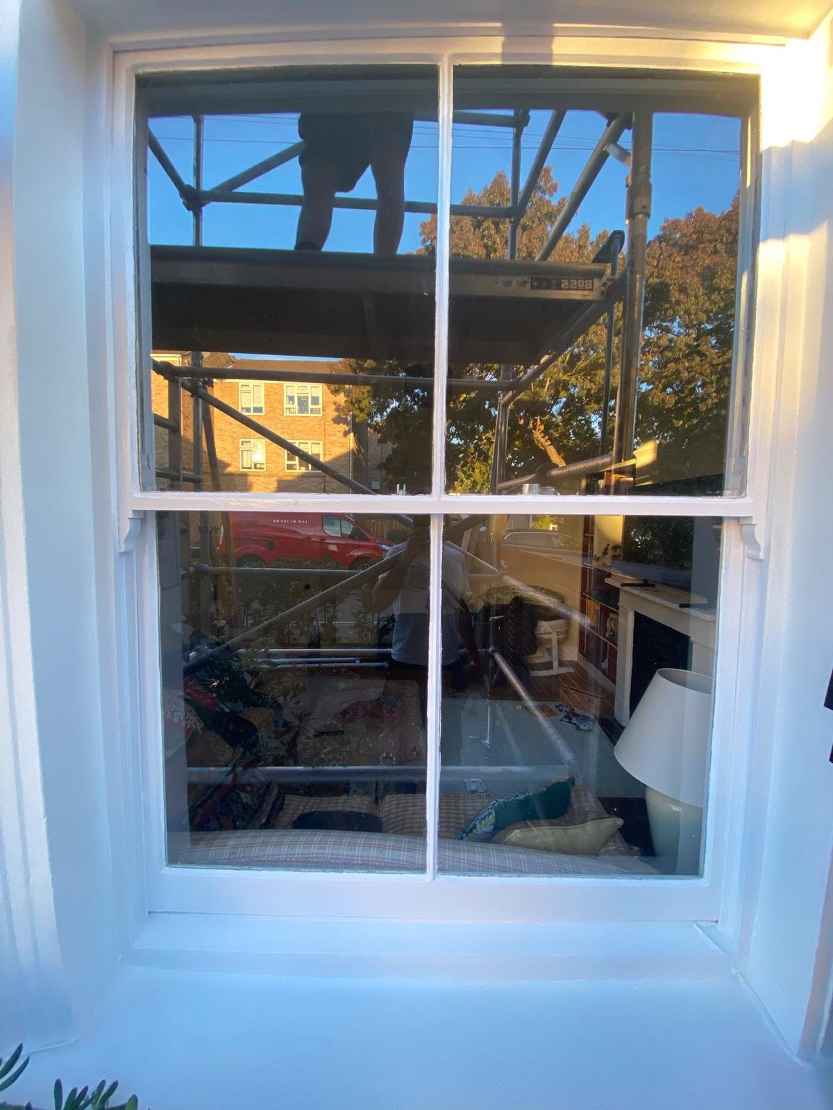 Project 02, after: White painted sash window frame and sill